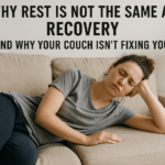 A lady resting on the couch. Why rest is not the same as recovery